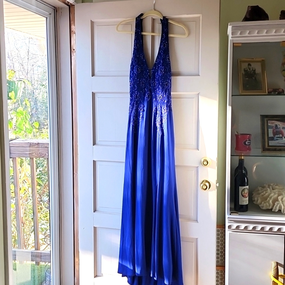 Royal Blue sequined formal by Niki Livas in size 12.